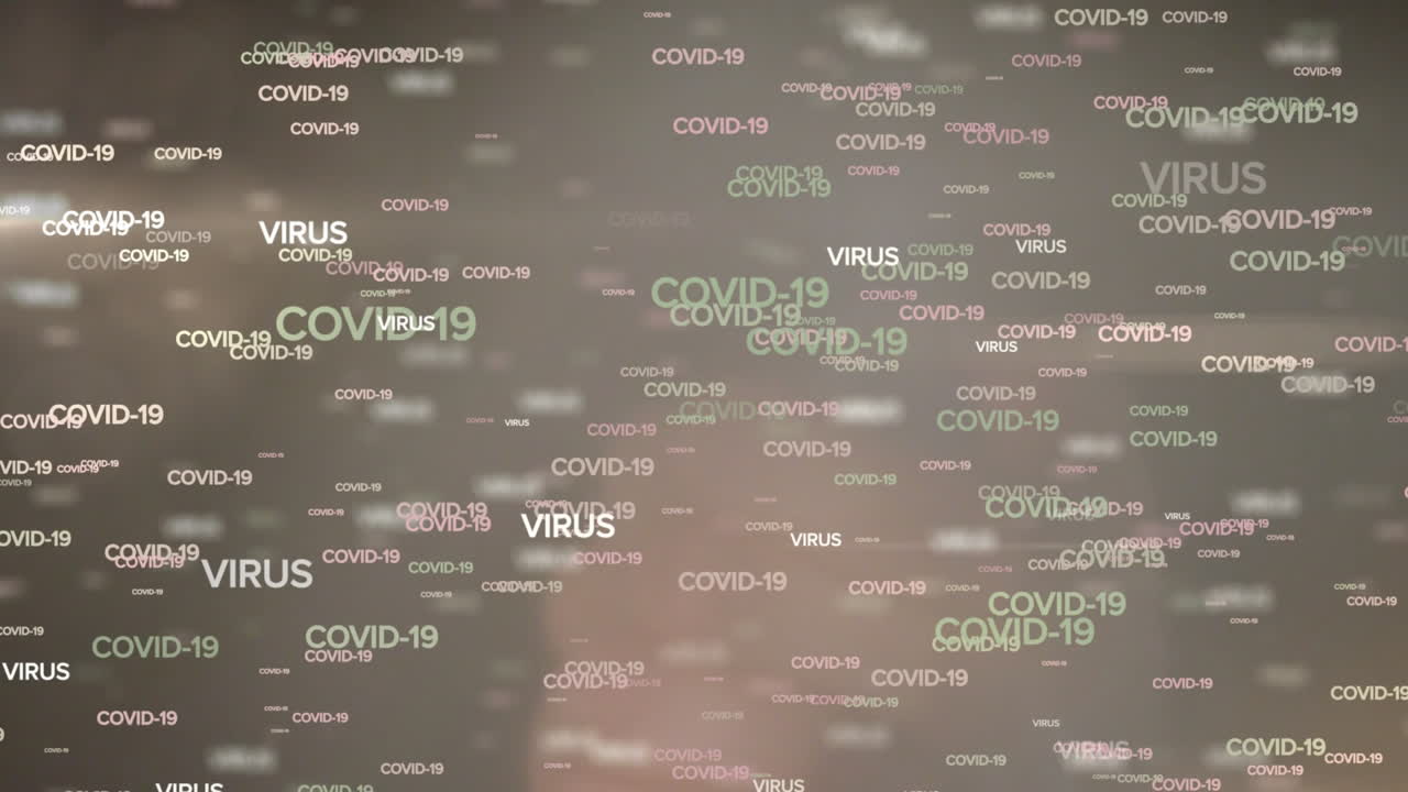 Covid-19 e testo sul virus contro la mano che usa uno spruzzino