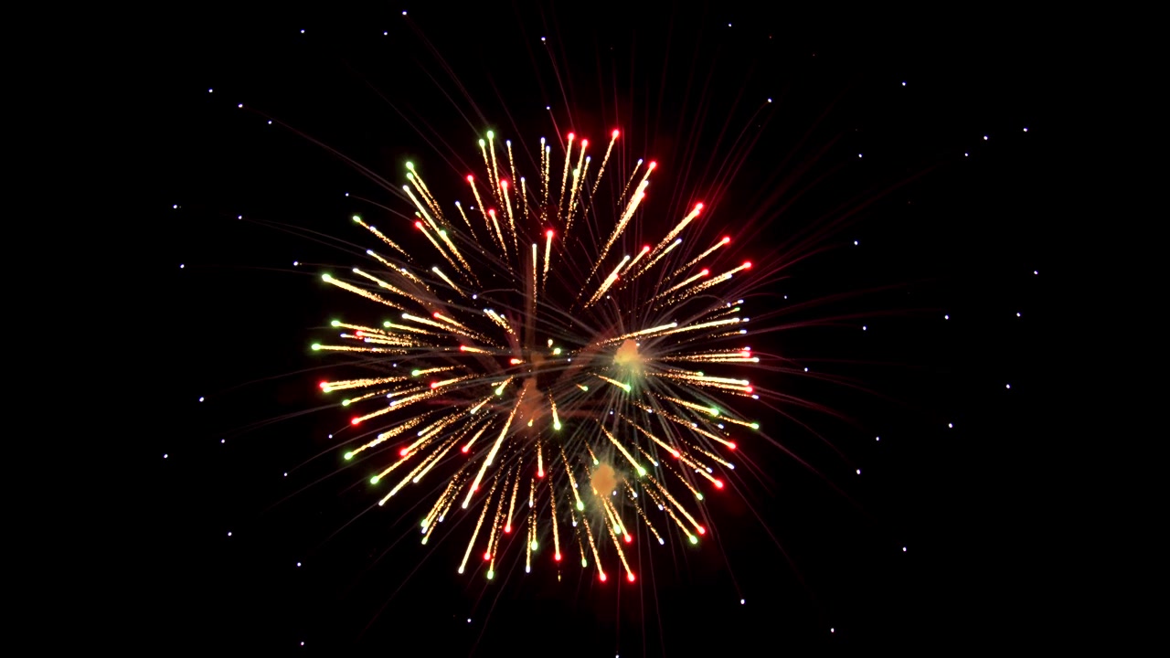Dramatic and colorful explosions of color in black night sky during fireworks display