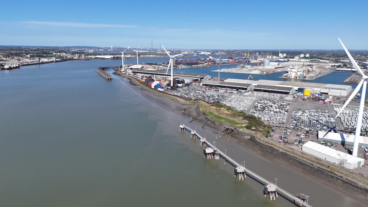 Wind turbines on River Thames Tilbury docks UK drone,aerial