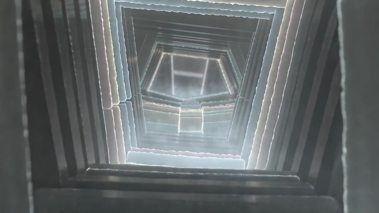 Gliding camera up repeating geometric shaft at center, revealing stacked neon frames and inner core