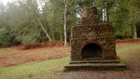 Mid-panning-shot-of-the-Portuguese-fireplace-World-War-One-War-Memorial-at-Lyndhurst,-New-Forest