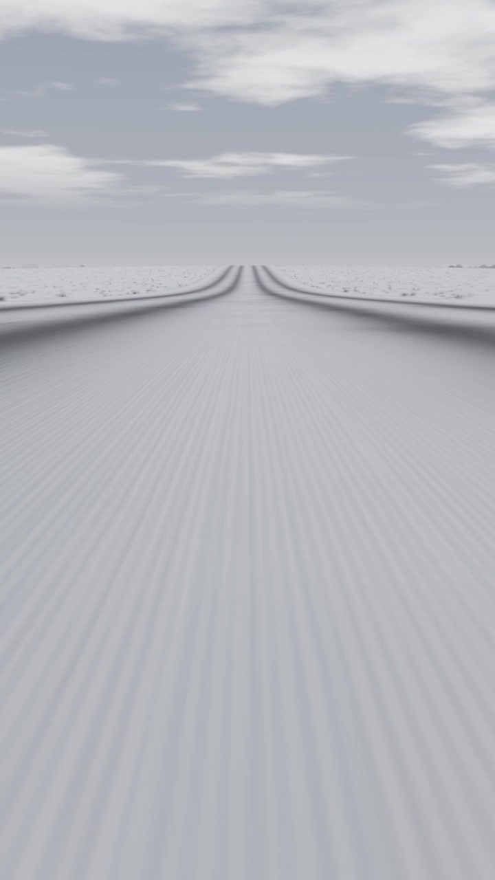 Vertical video: Starting camera moving along grooved plane to horizon and ridges under cloudy sky