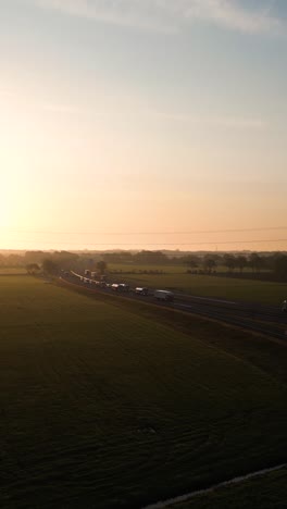 highway at sunrise/sunset over countryside