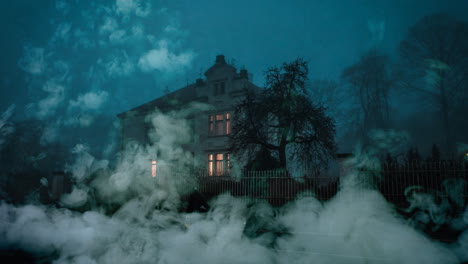 haunted house in smoke on halloween