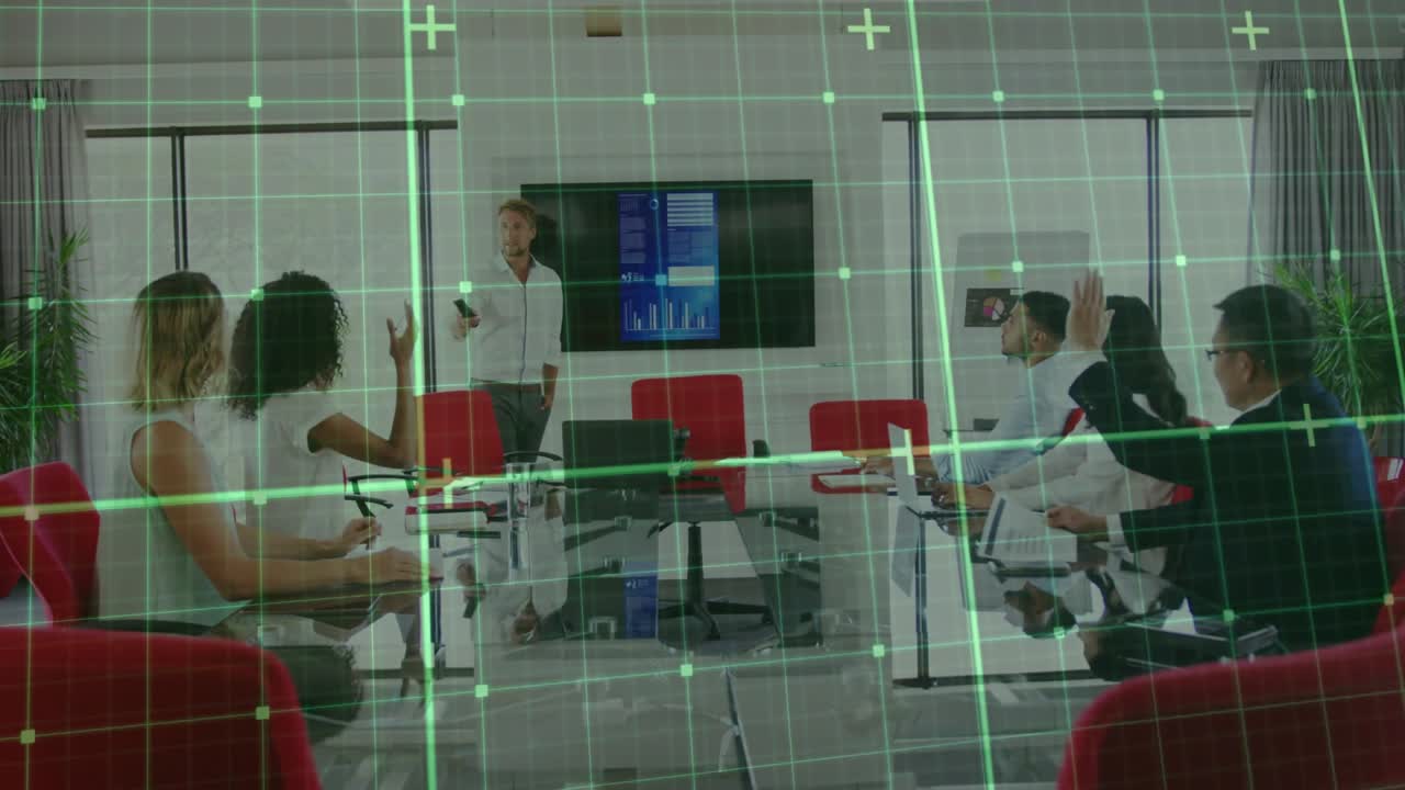 Presenter clicking remote causing green grid overlay encouraging business colleagues raising hands