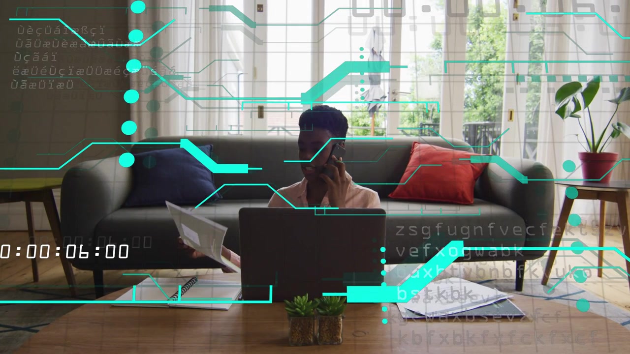 Woman answering phone while sorting business papers and using laptop, teal overlay showing timecode