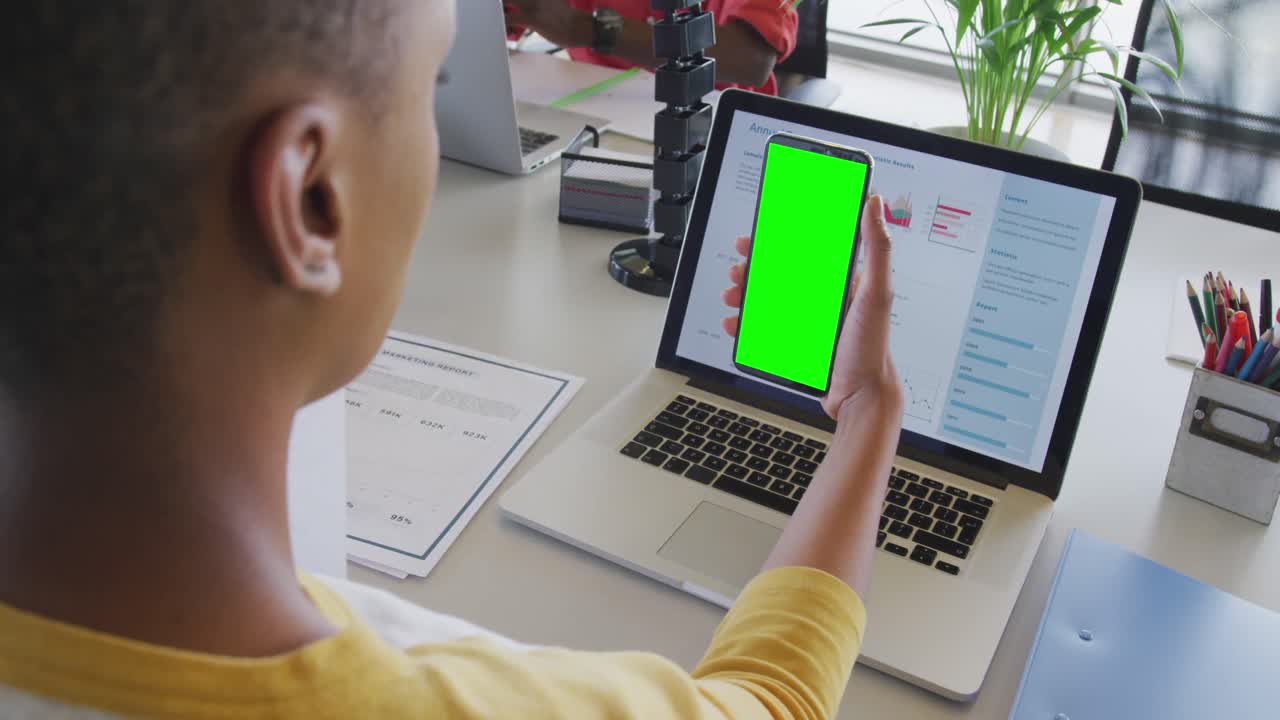 African american businesswoman using smartphone for video call with copy space