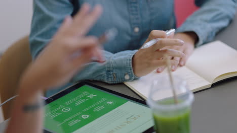 business woman hands using tablet browsing corporate document sharing creative ideas in office boardroom meeting close up