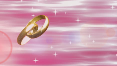 animation d'étoiles filantes et deux bagues de mariage en or entrelacées sur un fond rose étincelant