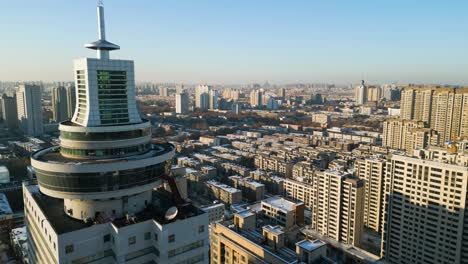 Drone-shot-of-Hotel-with-Residential-Area-in-Zibo-city,-Shandong-Province,-China