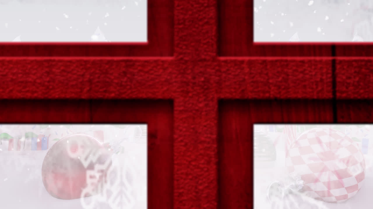 겨울 풍경에 크리스마스 장식 위에 내리는 눈에 대한 빨간 나무 창문 프레임