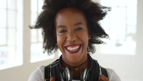 Composite-of-laughing,-edgy-woman-with-an-afro