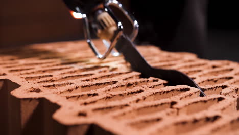 cutting brick with a flame cutter