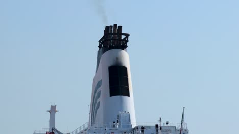 ship chimney emitting smoke in sorrento, naples