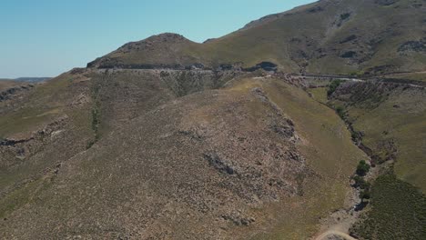mountain pass and steep slopes in chania region in crete, greece. aerial drone shot