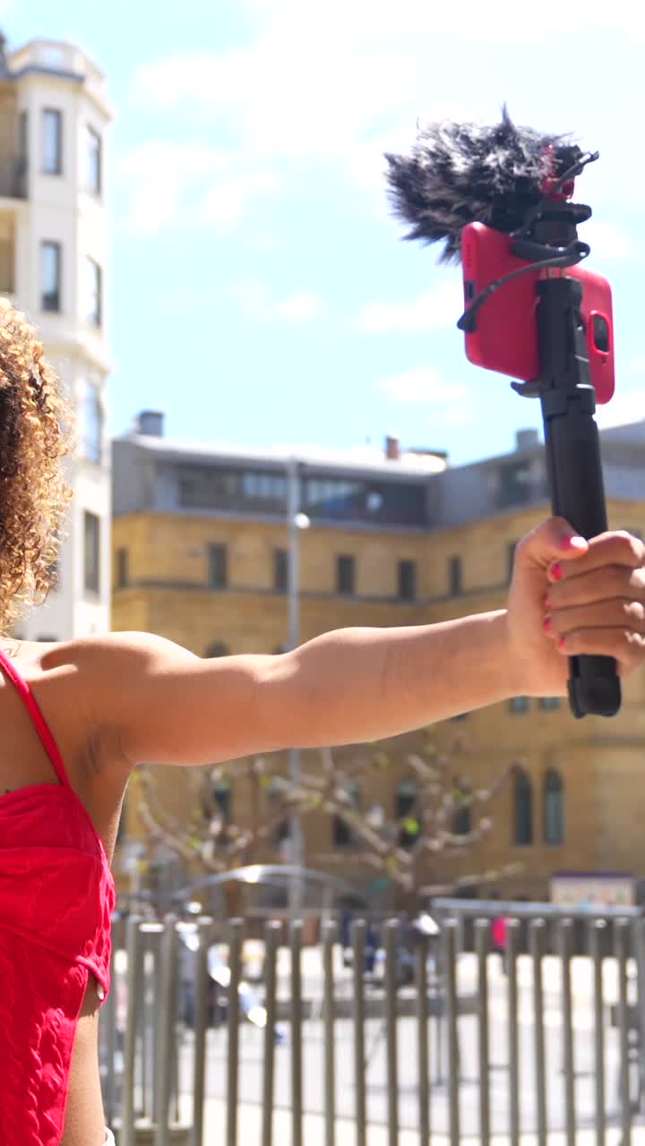 Woman vlogging in the city