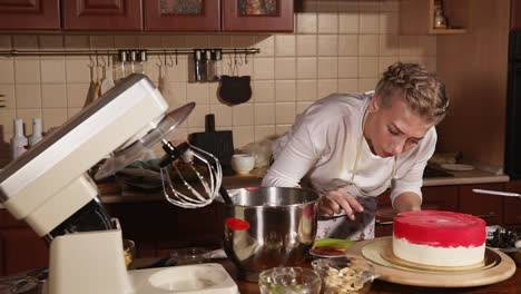 woman baking and decorating a beautiful cake