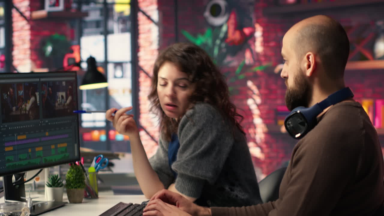 Creative team of editors collaborating on a movie montage project