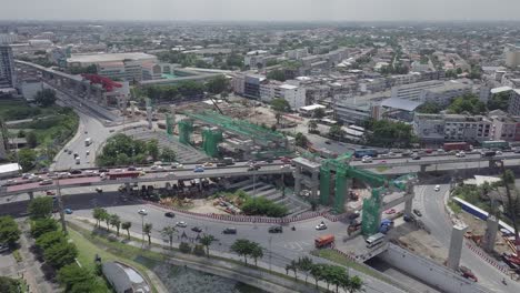 aerial view of public transport electricity train construction in roundabout