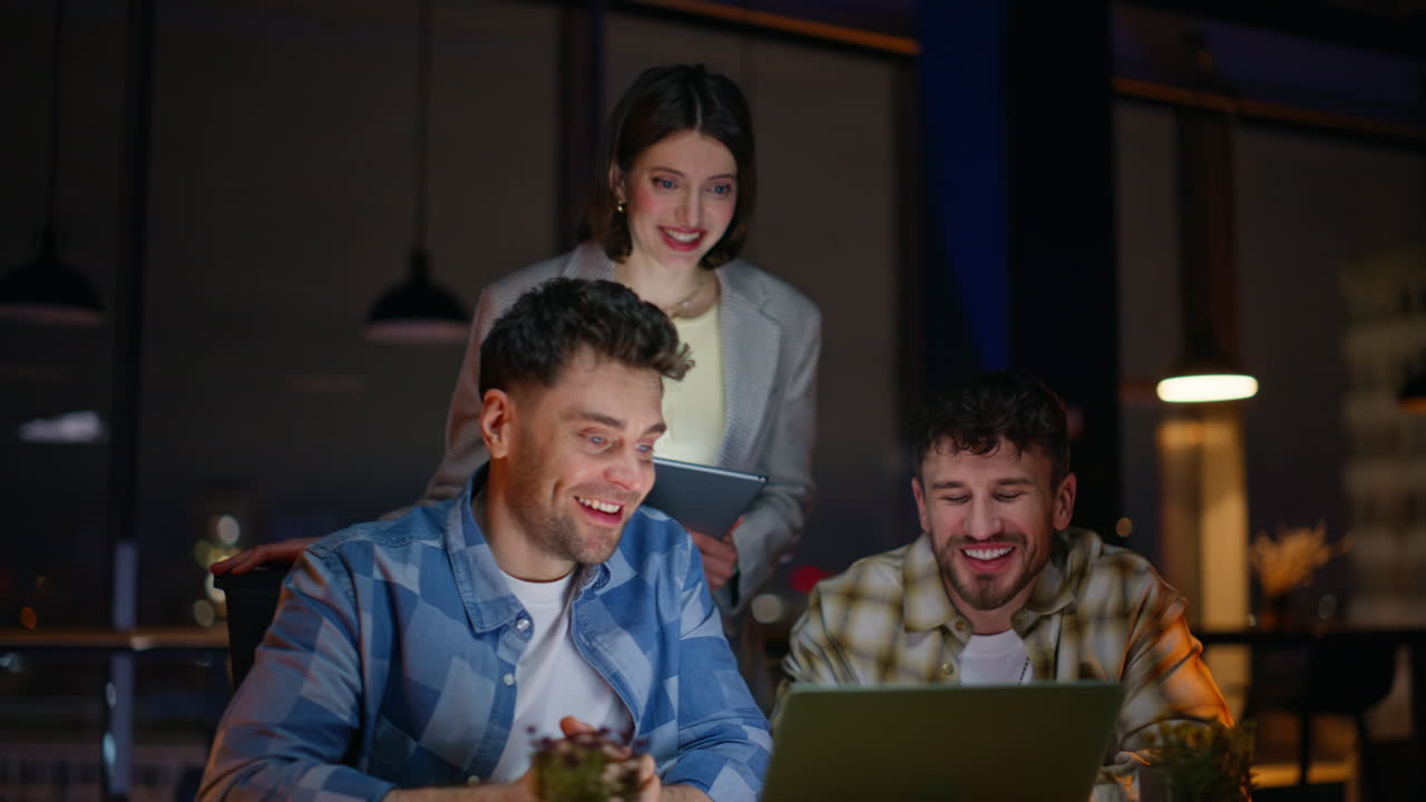 Colleagues videocalling laptop night cabinet closeup. Managers virtual meeting