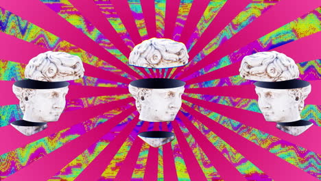 animación de esculturas de cabezas antiguas sobre un fondo a rayas rosadas.