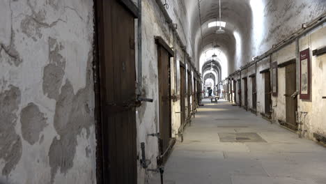 prison cell block at eastern state penitentiary from left side of aisle