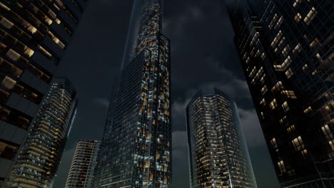 edificios de oficinas de rascacielos de vidrio con cielo oscuro