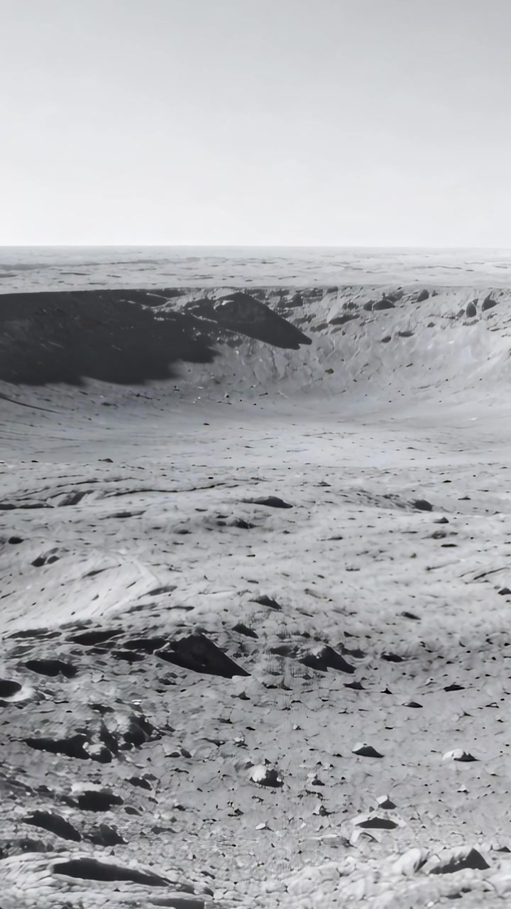 Vertical video: Panning probe after ping revealing cratered plain and rim at lunar surface, mapping