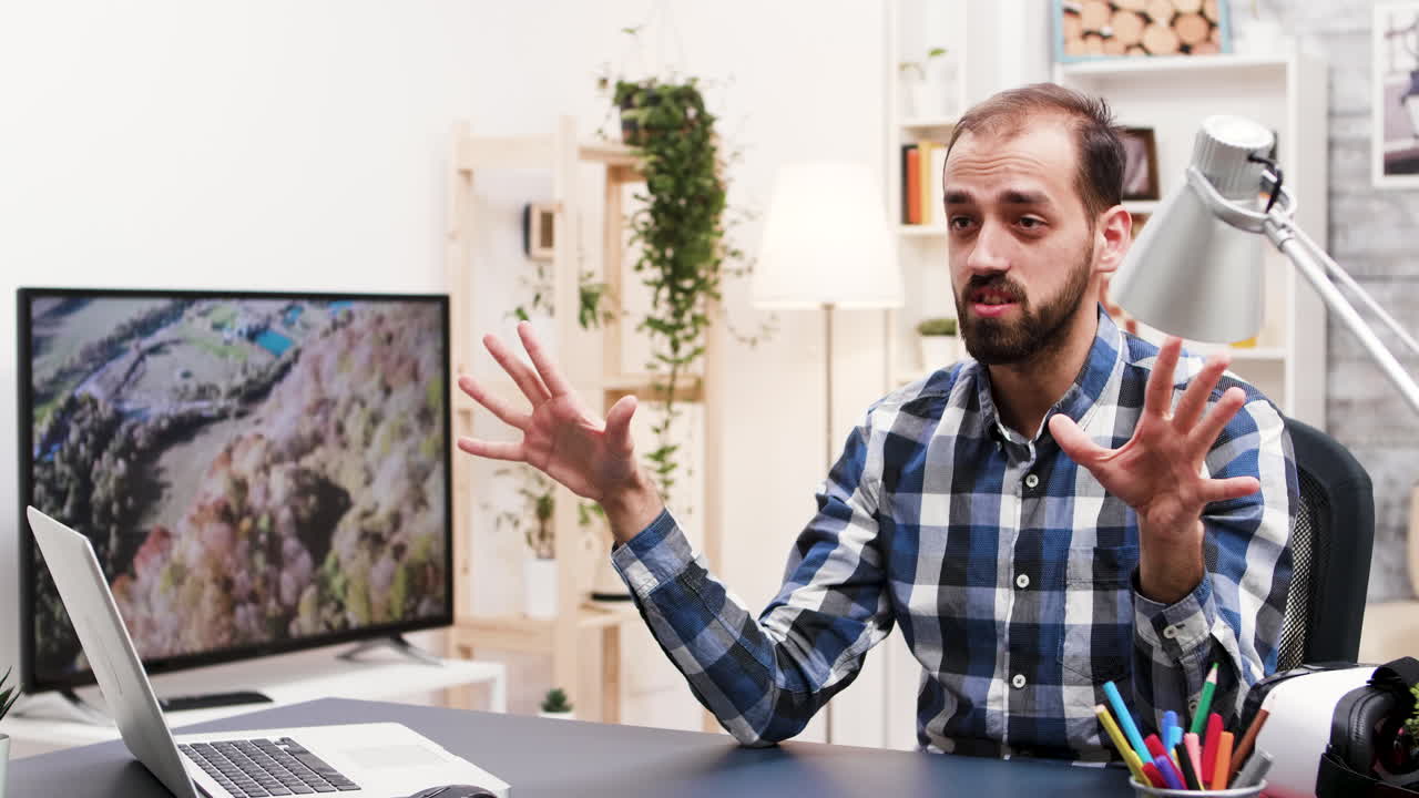 Man working at his desk in a modern office