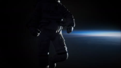 astronauta en el espacio exterior con el telón de fondo del planeta tierra. imagen de la tierra proporcionada por la nasa