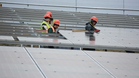 solar power concept. vinnitsa, ukraine - november 2017: installing alternative energy photovoltaic solar panels