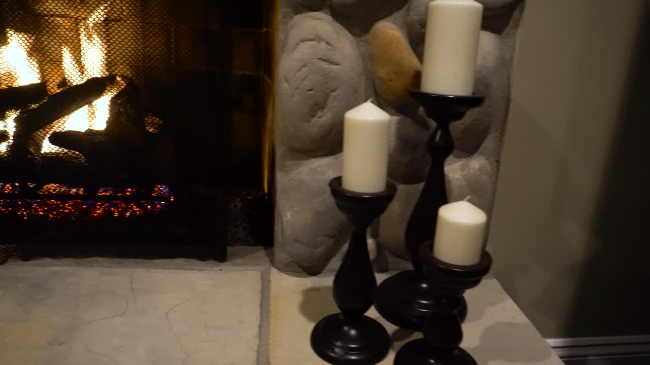 Brick Fireplace and wood burning fire with flickering flames. Warp Pano from right to left gas fireplace. Warm fireplace flames provide cozy interior.