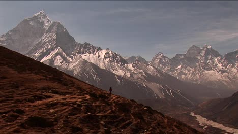 Wide-shot-of-trail-to-basecamp-with-trekker-walking