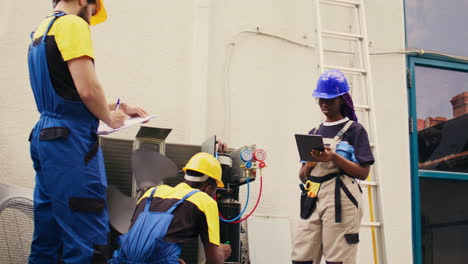 servicemen cleaning condenser coolants