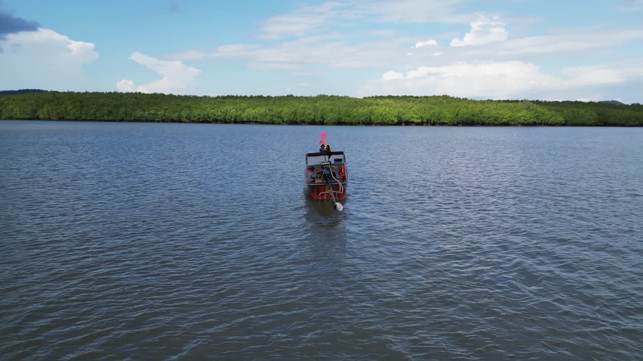 Longtail Boat on a Tropical River in Thailand