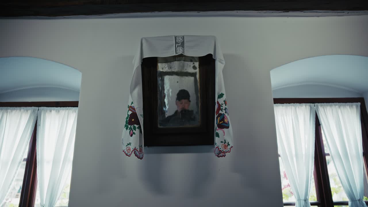 Reflection in an Antique Mirror in a Rustic Room