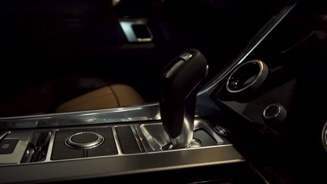 close-up of a luxury car interior gear shift