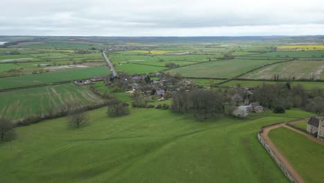 forward drone shot of landscape beside rockingham castle in northamptonshire, england