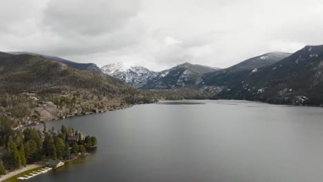 drone of ptarmigan mountain from grand lake colorado with a snowstorm coming over the peek over the lake