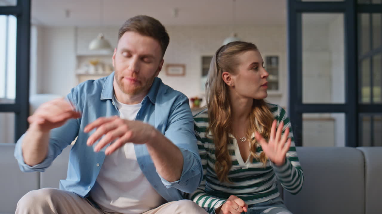 Emotional pair watching movie in cozy apartment closeup. Tv show tensed moment