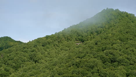 cinematic drone footage revealing hazy ridgelines