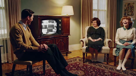 1950s family enjoying television