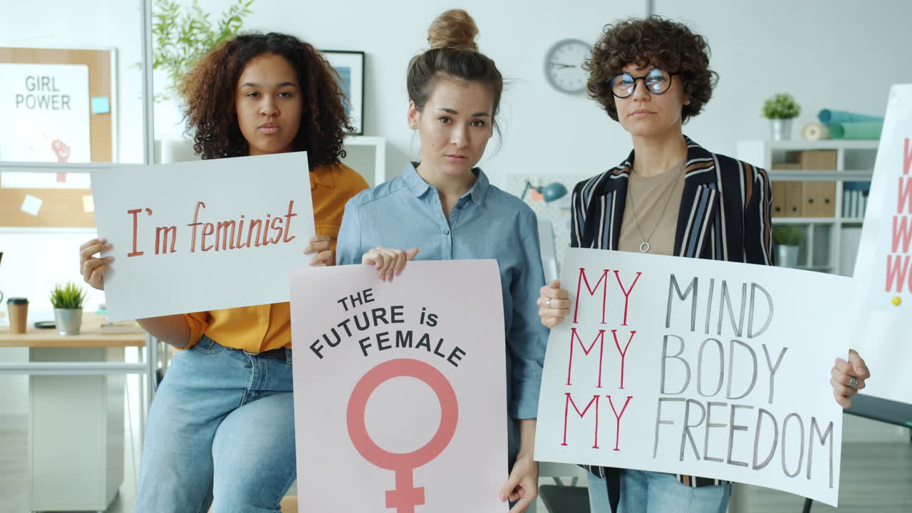 Women Holding Posters about Feminism and Empowerment