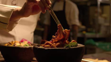 a chef meticulously arranging and presenting a culinary masterpiece on a plate