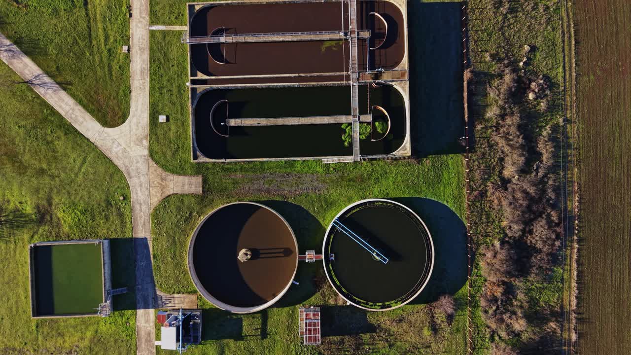 The treatment facility works on cleaning water in large tanks