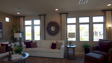 the beautifully designed modern living room of a home in las vegas, nevada - wide pan