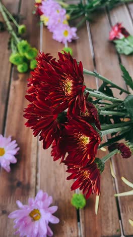 beautiful red chrysanthemum bouquet on wooden table