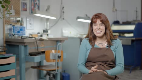 jeweler in her workshop
