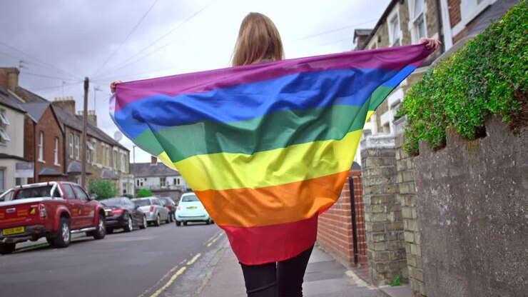 Pride Flag on Persons Shoulders