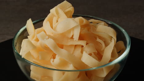 crispy dried squid in glass bowl